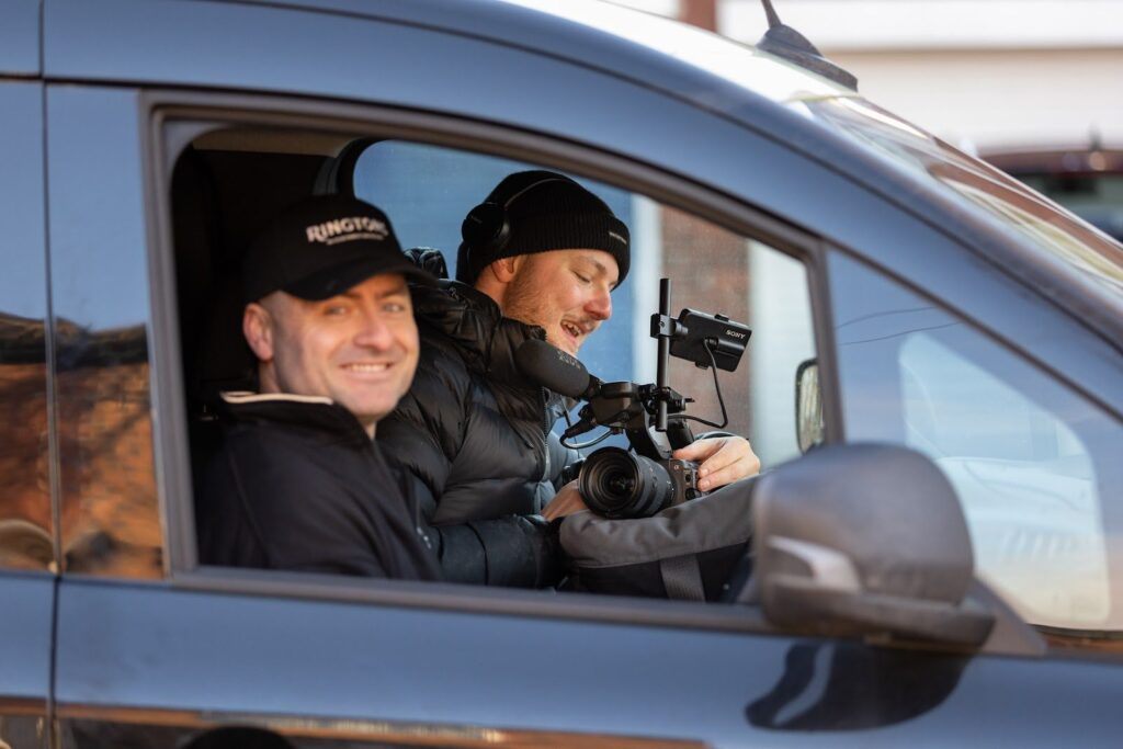Turps Film crew filming from the passenger seat of a Ringtons van
