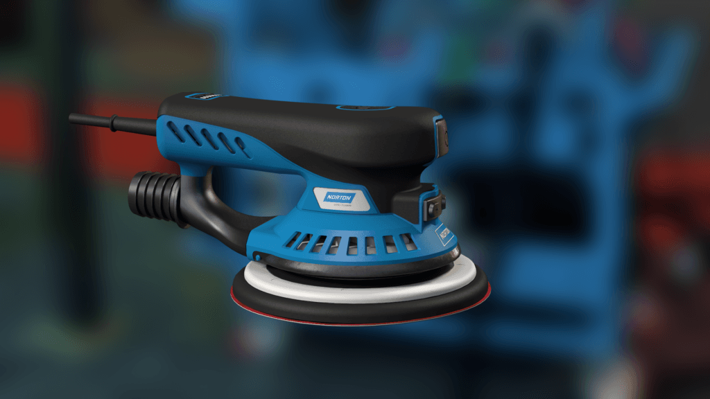 A blue and black electric sander with a circular sanding pad, showing ventilation holes and power cord attachment.