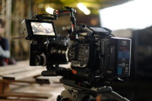 Cinema camera rig on set in a factory workshop