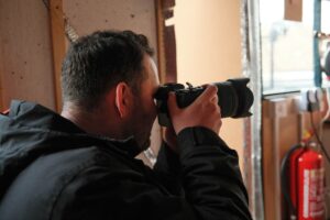 Cal, our photography partner, taking a photo on the Ringtons doorstep campaign